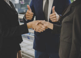 coach talking to new client as part of strategy to get first life coaching client