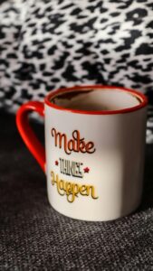 A coffee mug with print 'make things happen': A way to inspire coaches to use SMART Goals for Coaches to achieve their goals